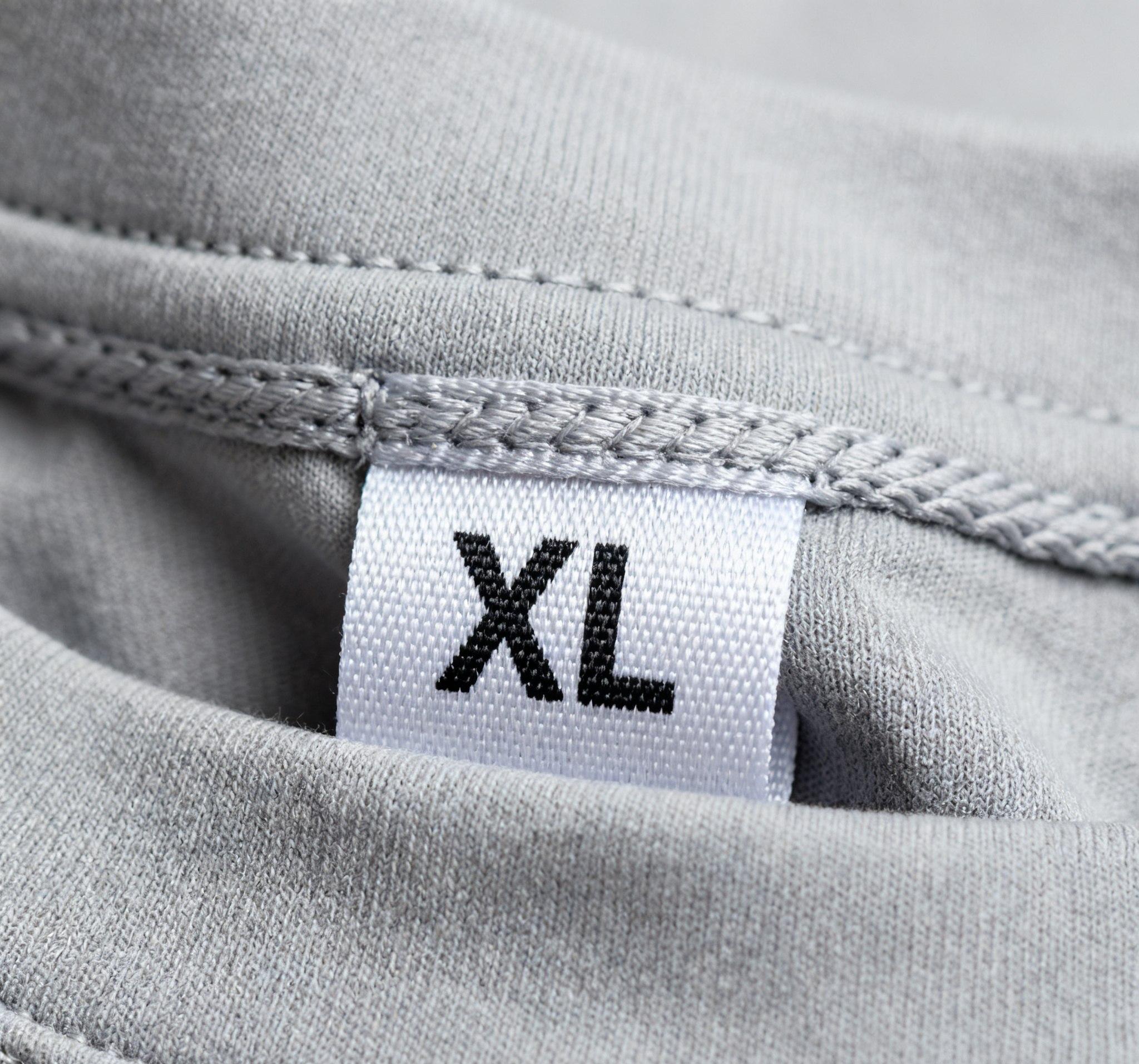 Standard woven size labels inside clothing seam
